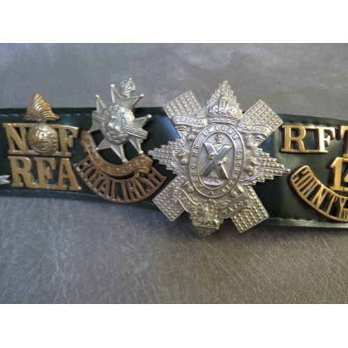 363 - A LEATHER BELT OF MILITARY BADGES AND BUTTONS, to include 'T14 County of London' title and Army Cycl... 