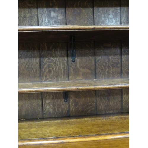 1177 - A 19TH CENTURY OAK COUNTRY DRESSER, having an enclosed plate rack with two crossbanded cupboards, ab... 