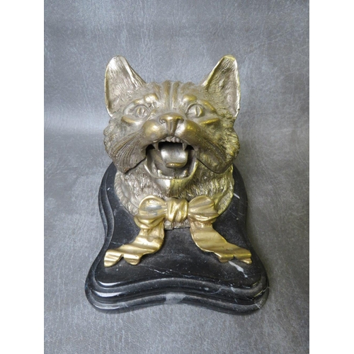 867 - A LARGE VINTAGE NOVELTY CAT INKWELL, the hinged lid opening to a circular inkwell on a shaped steppe... 