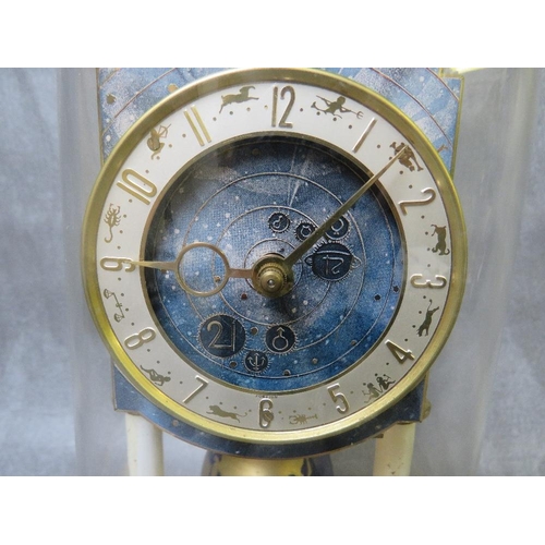 1145 - A 400 DAY KAISER UNIVERSE CLOCK WITH GLASS DOME, having a world globe rotating pendulum and upper mo... 