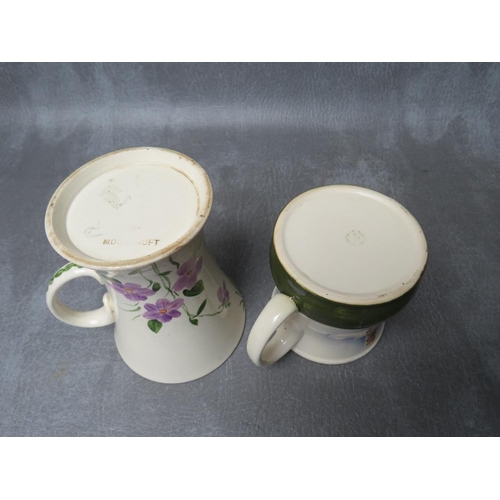 991 - A MOORCROFT 'KILN' MUG, dated 1986, H 9 cm, together with another taller floral mug (2)