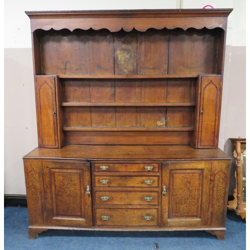 1181 - A GEORGIAN OAK CROSSBANDED WELSH DRESSER, the enclosed upper section with two crossbanded cupboards,... 