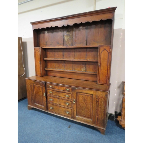 1181 - A GEORGIAN OAK CROSSBANDED WELSH DRESSER, the enclosed upper section with two crossbanded cupboards,... 