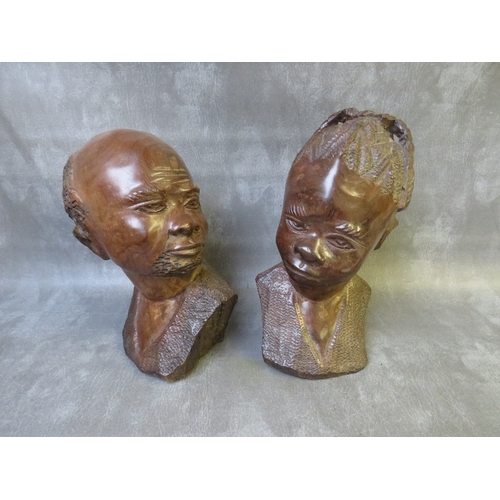 1087 - A PAIR OF CARVED IRONWOOD STUDIES OF AN AFRICAN MAN AND WOMAN, tallest H 32 cm