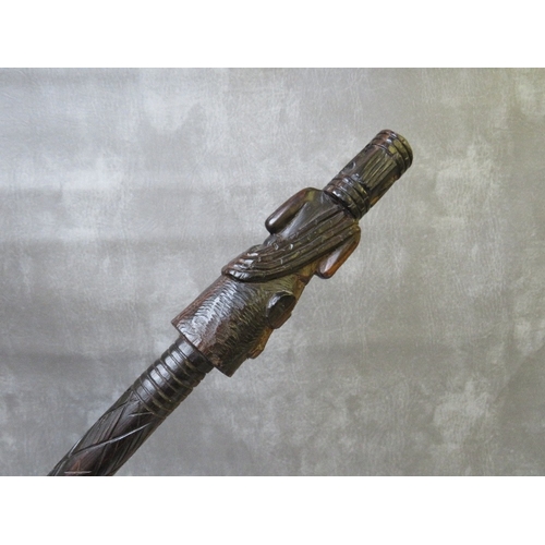 1089 - A VINTAGE CARVED WOODEN WALKING STICK, with religious figure as handle, L 87 cm