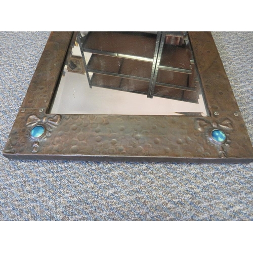 1150 - A 19TH CENTURY ART NOUVEAU PEWTER FRAMED MIRROR, with turquoise cabochons, frame 68 x 40 cm, mirror ... 