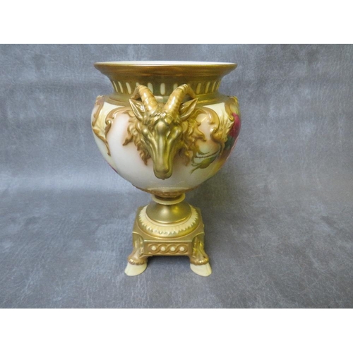 1017 - A ROYAL WORCESTER BLUSH IVORY PEDESTAL VASE, decorated with roses , having rams head masks to each s... 