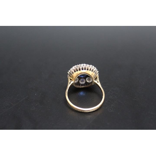 640 - AN 18CT AND PLATINUM SAPPHIRE AND DIAMOND RING, the central sapphire being of an estimated 2.54 cara... 