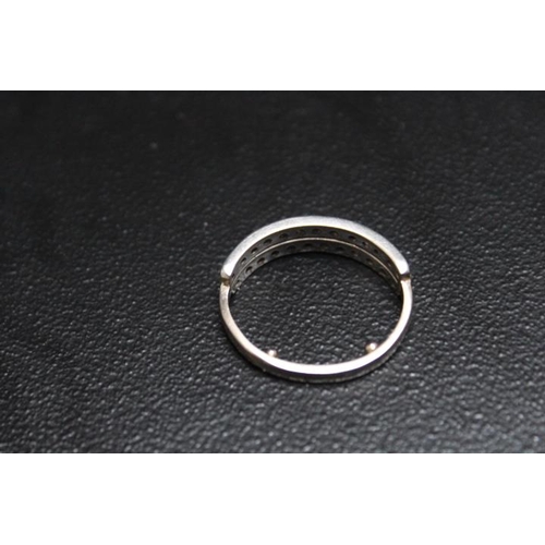 651 - A TWIN ROW DIAMOND SET HALF ETERNITY RING, looks to have had a replacement shank with two resizing n... 