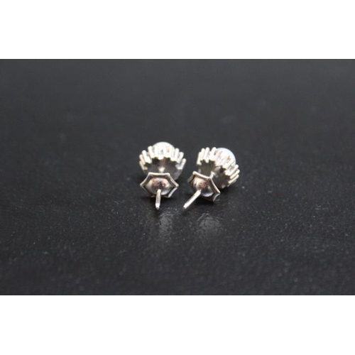 662 - A PAIR OF HALLMARKED 9 CARAT GOLD PEARL AND DIAMOND EARRINGS, approx weight 2.2g, Dia 1 cm