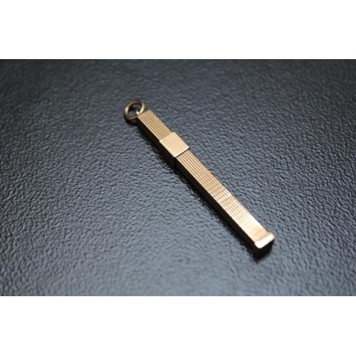 628 - A NOVELTY HALLMARKED 9 CARAT GOLD PROPELLING TOOTHPICK, approx weight 3.9g, extended L 7.5 cm