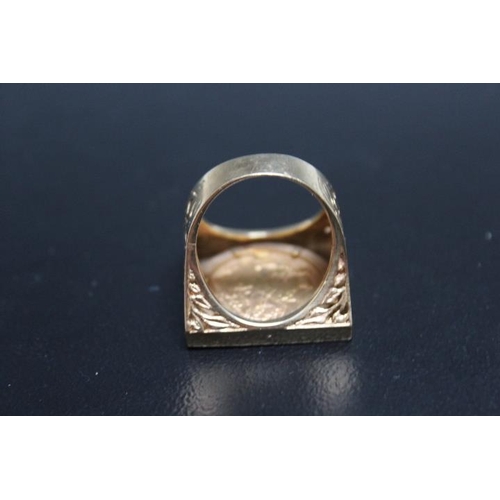 635 - A HALLMARKED 9 CARAT GOLD RING SET WITH A QUEEN VICTORIA SOVEREIGN, in a 'squared' setting, approx w... 