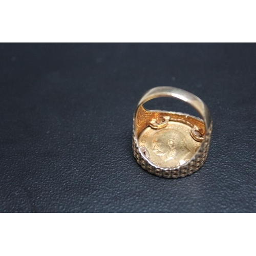 637 - A HALLMARKED 9 CARAT GOLD GEORGE V SOVEREIGN RING, the sovereign being dated 1911, approx weight 16.... 