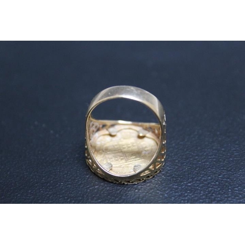 664 - A HALLMARKED 9 CARAT GOLD RING SET WITH A QUEEN VICTORIA SHIELD BACK HALF SOVEREIGN DATED 1887, appr... 