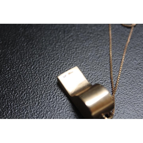 675 - A NOVELTY HALLMARKED 9 CARAT GOLD PENDANT IN THE FORM OF A WHISTLE, on a 9 ct gold chain, approx com... 