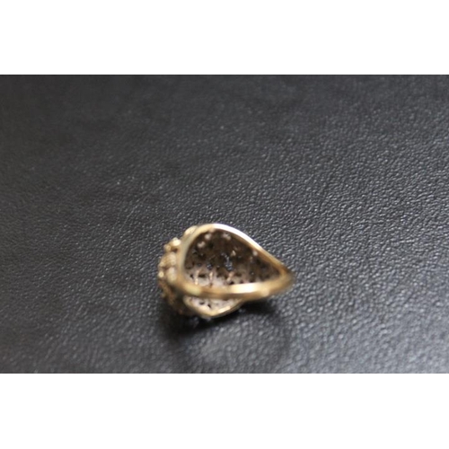 681 - A HALLMARKED 9 CARAT GOLD DOMED TEXTURED RING, approx weight 7.4g