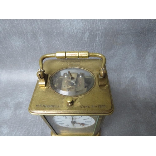 1148 - A SMALL 19TH CENTURY FRENCH REPEATER BRASS CARRIAGE CLOCK, with swing handle, H 14.5 cm