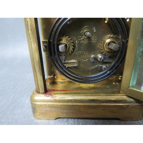 1148 - A SMALL 19TH CENTURY FRENCH REPEATER BRASS CARRIAGE CLOCK, with swing handle, H 14.5 cm