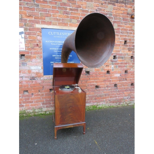 1123 - AN EXPERT SENIOR E.M. GINN GRAMAPHONE, floor standing in a mahogany case, with a large papier appliq... 