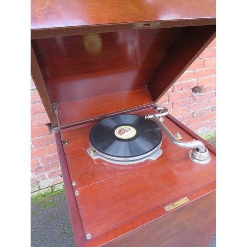 1123 - AN EXPERT SENIOR E.M. GINN GRAMAPHONE, floor standing in a mahogany case, with a large papier appliq... 