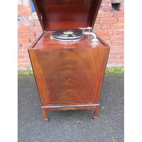 1123 - AN EXPERT SENIOR E.M. GINN GRAMAPHONE, floor standing in a mahogany case, with a large papier appliq... 