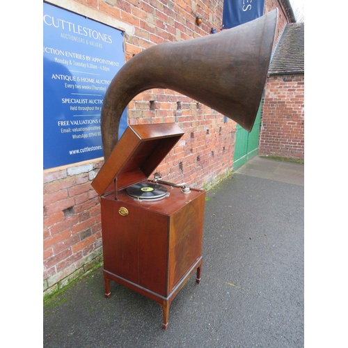 1123 - AN EXPERT SENIOR E.M. GINN GRAMAPHONE, floor standing in a mahogany case, with a large papier appliq... 