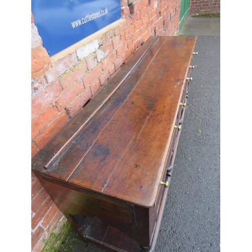 1170 - A 19TH CENTURY OAK DRESSER - POSSIBLY SHROPSHIRE, having three frieze drawers above a shaped apron, ... 