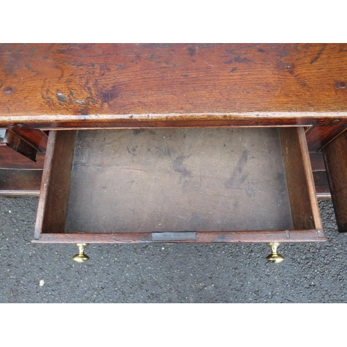 1170 - A 19TH CENTURY OAK DRESSER - POSSIBLY SHROPSHIRE, having three frieze drawers above a shaped apron, ... 