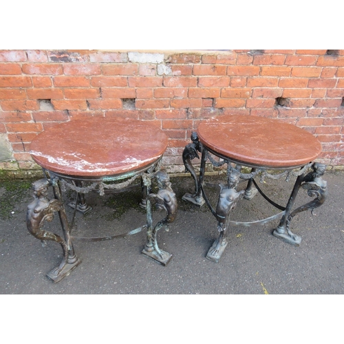 1173 - A PAIR OF 19TH CENTURY BRONZE AND MARBLE TOPPED TABLES IN THE EMPIRE STYLE, each with four winged fi... 