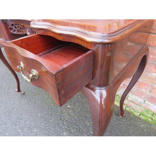 1167 - A LATE 19TH CENTURY MAHOGANY LADIES WRITING DESK, having a shaped inset leather writing surface, car... 