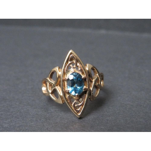 691 - A VINTAGE CLOGAU GOLD LADIES 9CT GOLD LADIES DRESS RING, of Celtic design, set with blue stone, ring... 