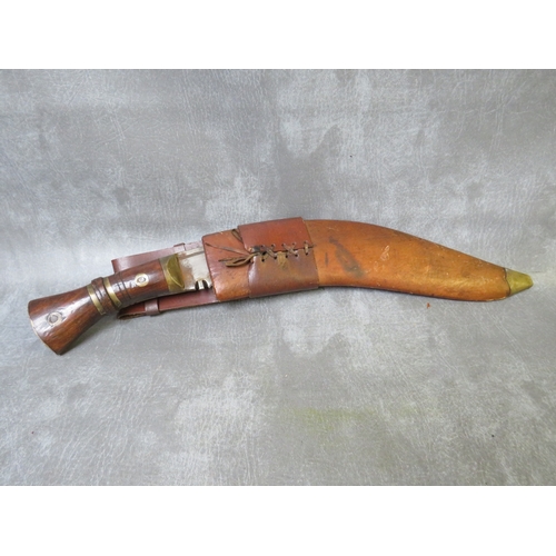 1116 - AN EARLY MILITARY KUKRI KNIFE, in leather covered wooden sheath, bearing date 1917 and inscription o... 