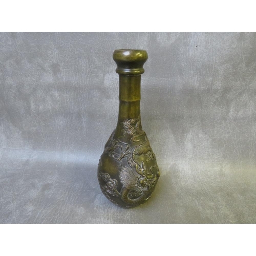 1035 - AN ORIENTAL BRONZE ONION SHAPED VASE, decorated with a five claw dragon in relief, with a four chara... 