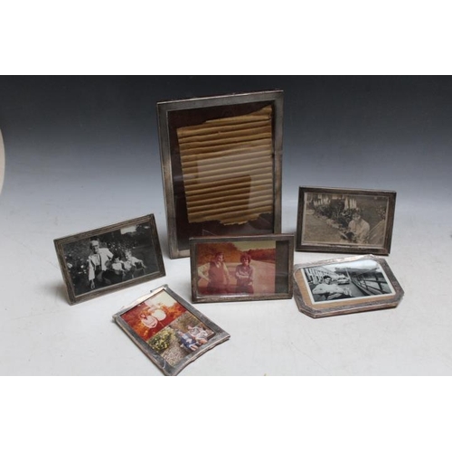 807 - A COLLECTION OF SIX ASSORTED HALLMARKED SILVER PHOTO FRAMES, various dates and makers, Tallest H 25.... 