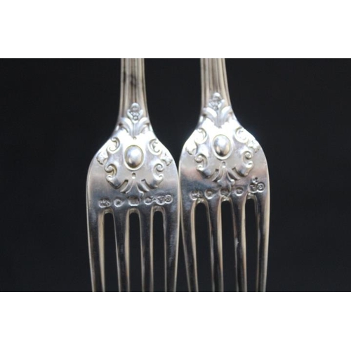 811 - CHAWBER & C0 - A SET OF HALLMARKED SILVER DECORATIVE DOUBLE STRUCK FORKS BY GEORGE ADAMS - LONDON 18... 