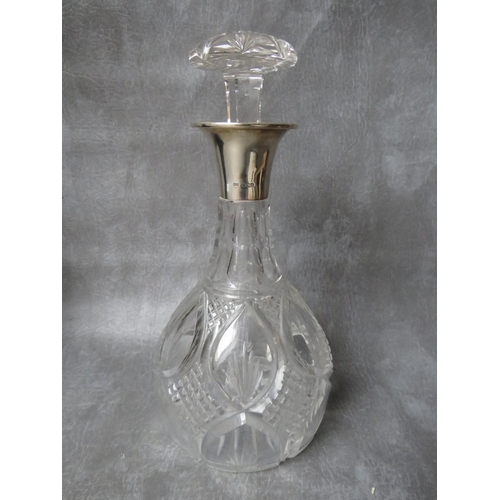 937 - A SILVER MOUNTED CUT GLASS DECANTER, Walker & Hall, Sheffield, 1923, H 27 cm