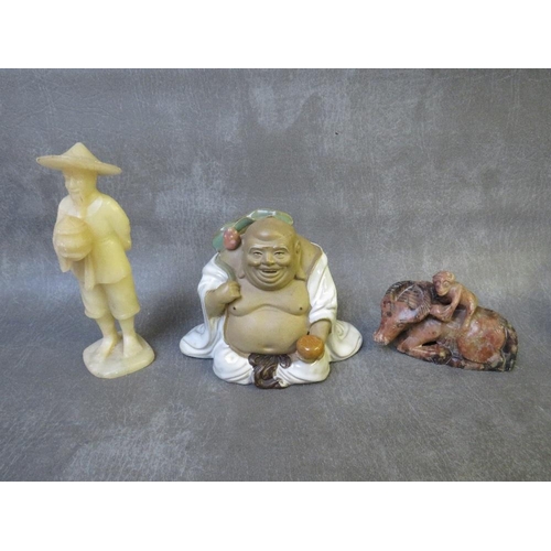 1027 - A VINTAGE CHINESE HARDSTONE FIGURE CARRYING A BASKET, together with a seated Buddha and a soapstone ... 