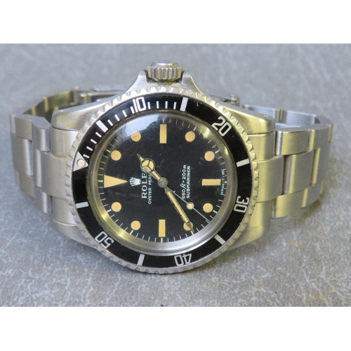 733 - ROLEX - A GENTLEMANS STAINLESS STEEL OYSTER PERPETUAL SUBMARINER WRISTWATCH - REF 5513, black lumino... 