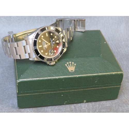 738 - ROLEX - A STAINLESS STEEL OYSTER PERPETUAL SUBMARIMER DATE WRISTWATCH, black dial with luminous tria... 