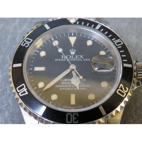 738 - ROLEX - A STAINLESS STEEL OYSTER PERPETUAL SUBMARIMER DATE WRISTWATCH, black dial with luminous tria... 