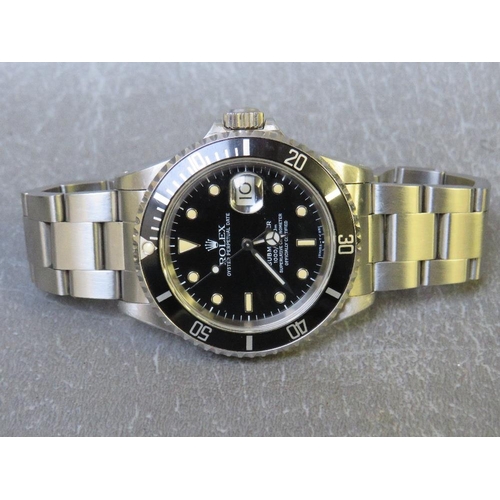 738 - ROLEX - A STAINLESS STEEL OYSTER PERPETUAL SUBMARIMER DATE WRISTWATCH, black dial with luminous tria... 