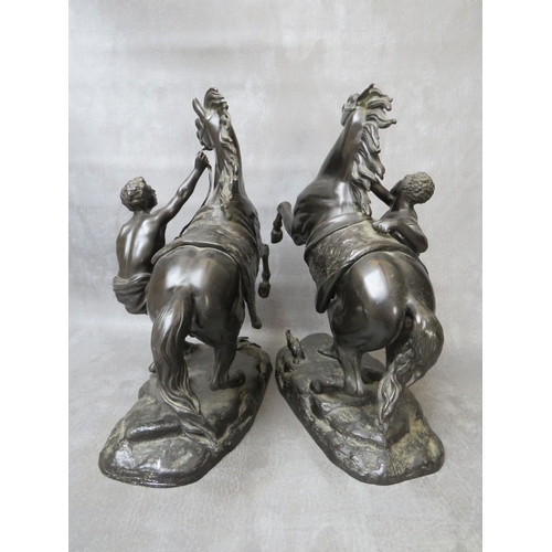 870 - A PAIR OF FINELY CAST BRONZE MARLY HORSES WITH TRAINER, H 34 cm