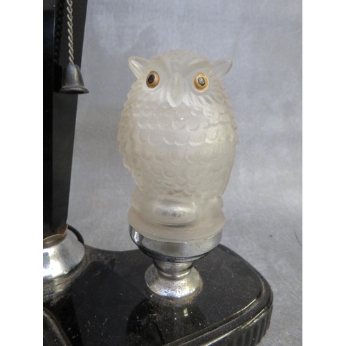 1125 - AN ART DECO BAKELITE TABLE LAMP WITH GLASS OWL CAR MASCOT, the glass owl car mascot illuminating alo... 