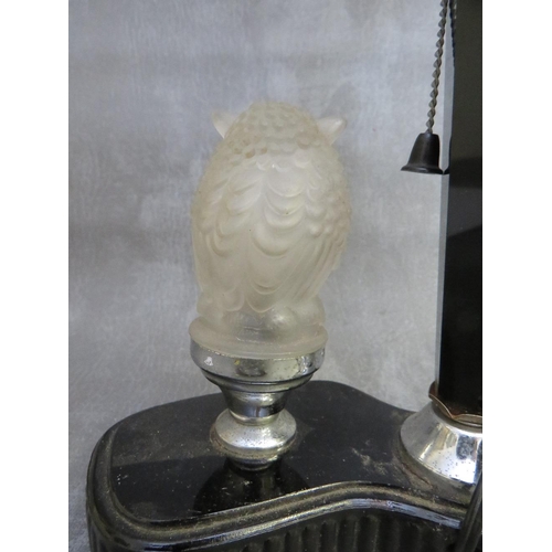 1125 - AN ART DECO BAKELITE TABLE LAMP WITH GLASS OWL CAR MASCOT, the glass owl car mascot illuminating alo... 