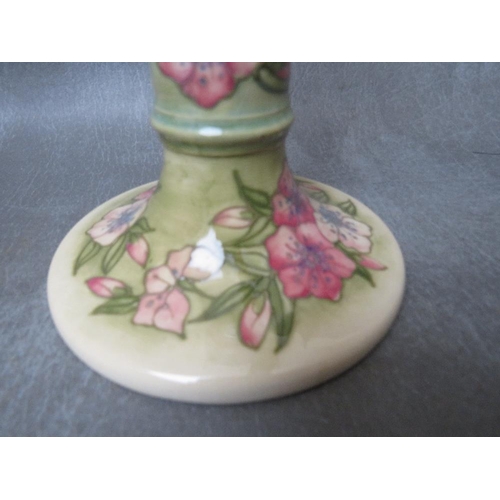 961 - A MOORCROFT 'CHERRY BLOSSOM' CANDLESTICK, cream, green and pale blue ground with tube-lined cherry b... 