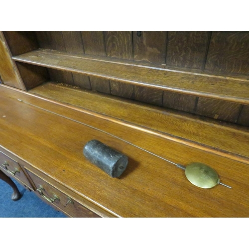 1131 - AN OAK CASED 30 HOUR LONG CASE CLOCK BY THOMAS BROWN OF LITCHBOROUGH, having a birdcage movement, ho... 