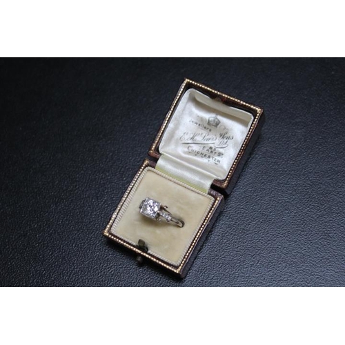 703 - A VINTAGE PLATINUM DIAMOND SOLITAIRE RING, set with a brilliant cut diamond of an estimated 1 carat ... 