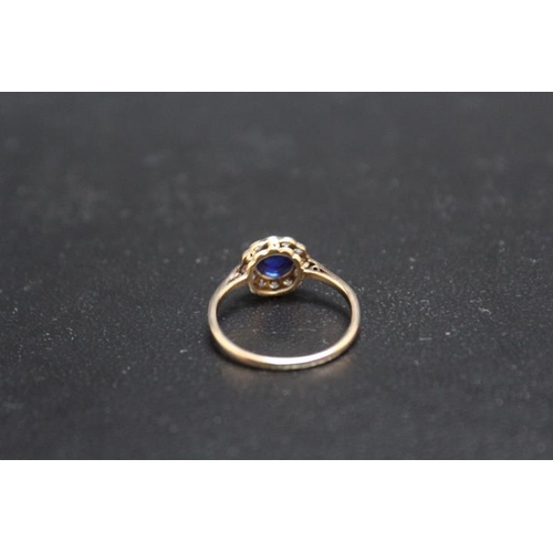 704 - A CABACHON SHAPPHIRE AND DIAMOND RING, set in yellow metal indistictly stamped 18, approx weight 2.2... 