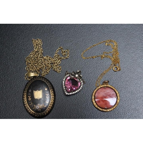 706 - A COLLECTION OF VINTAGE PENDANTS, two bieing on chains stamped 9K, approx combined weight of chains ... 