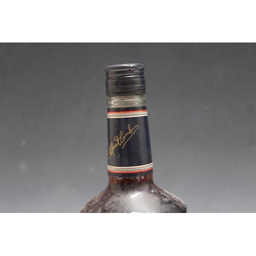 922 - A VINTAGE 1 LITRE BOTTLING OF LAMB'S NAVY RUM